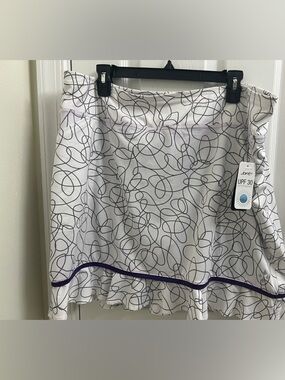 Jofit White Athletic Skort with Scribble Print and Matching Purple Top. New
